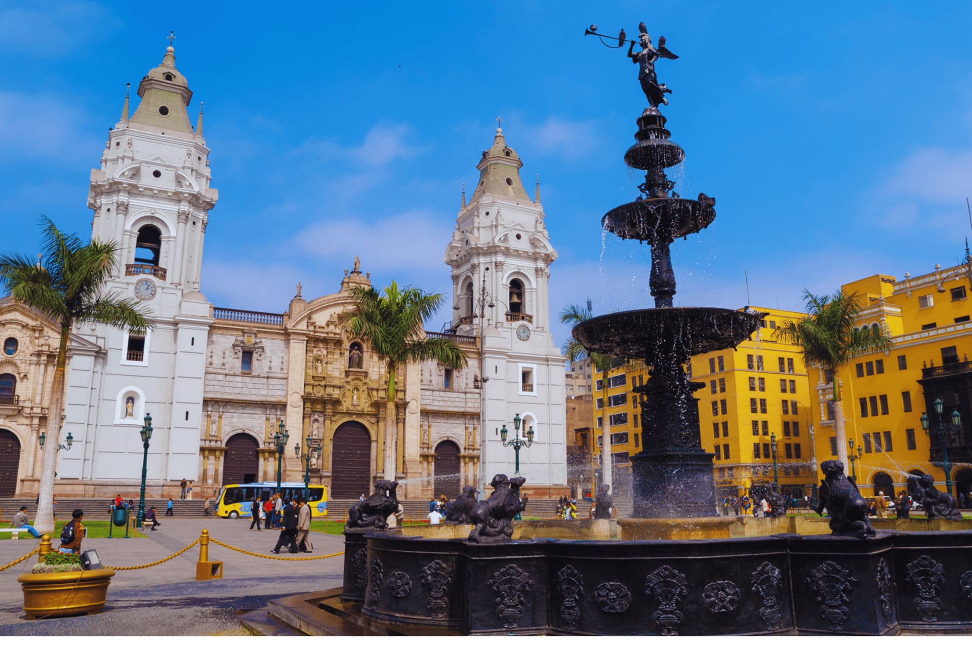 Panoramic view of Lima's Plaza Mayor featuring its iconic colonial fountain during the Lima City Tour.